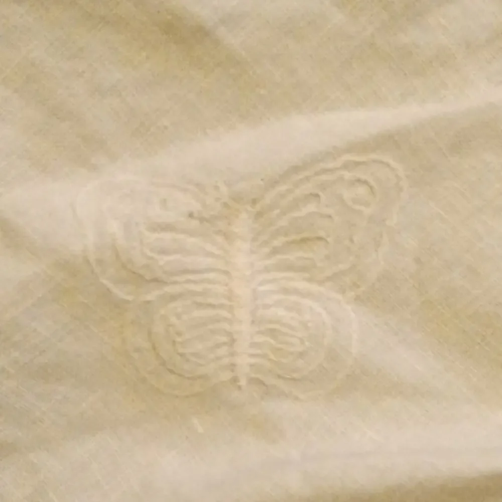 Cream‎ embroidered table runner with crochet trim